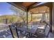 Back patio features desert mountain views and fireplace at 40445 N 32Nd St, Cave Creek, AZ 85331