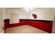 Bedroom with a ceiling fan, red and black accent paint, and tile flooring at 4547 W Villa Theresa Dr, Glendale, AZ 85308