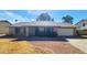 Charming single-story brick home with a well-maintained lawn, offering a classic and inviting curb appeal at 4547 W Villa Theresa Dr, Glendale, AZ 85308
