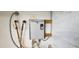 Close up of a wall mounted Rheem water heater at 4547 W Villa Theresa Dr, Glendale, AZ 85308