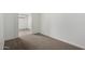 Bedroom features plush carpet, an AC unit, and neutral walls at 4813 N 62Nd Ave, Phoenix, AZ 85033