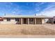A cozy single-level home with a covered entrance and driveway, offering a blend of comfort and convenience at 4813 N 62Nd Ave, Phoenix, AZ 85033
