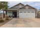 Charming single-Gathering home boasts a well-manicured front yard and attached two-car garage at 5030 S 23Rd Ave, Phoenix, AZ 85041