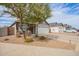 Single-Gathering home featuring desert landscaping, fenced yard, and an attached two-car garage at 5030 S 23Rd Ave, Phoenix, AZ 85041