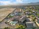 Expansive estate featuring a pool, an outdoor patio, mature landscaping and gorgeous mountain views at 5203 N 179Th Dr, Litchfield Park, AZ 85340