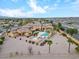 Luxury estate features a private pool, lush landscaping, mature trees, and gorgeous mountain views at 5203 N 179Th Dr, Litchfield Park, AZ 85340