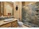 Bathroom featuring walk in shower and single sink vanity at 5203 N 179Th Dr, Litchfield Park, AZ 85340