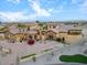 Impressive estate with mature palms, stone accents, manicured landscape, and circular driveway at 5203 N 179Th Dr, Litchfield Park, AZ 85340