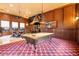 Entertainment haven: Game room featuring a billiard table, custom lighting, and a built-in bar area at 5203 N 179Th Dr, Litchfield Park, AZ 85340