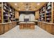 Library featuring custom wood built-ins and large work spaces at 5203 N 179Th Dr, Litchfield Park, AZ 85340