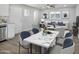 Cozy living and dining area featuring hardwood floors, neutral walls, and lots of natural light at 533 N Sirrine --, Mesa, AZ 85201