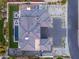 Aerial view of the property highlighting the well-manicured lawn and modern pool area at 7120 E Paradise Ranch Rd, Paradise Valley, AZ 85253
