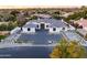 Stunning single-story home boasting elegant architecture and a beautifully landscaped front yard at 7120 E Paradise Ranch Rd, Paradise Valley, AZ 85253