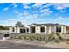 Elegant single-story home featuring a contemporary design and manicured desert landscaping at 7120 E Paradise Ranch Rd, Paradise Valley, AZ 85253