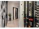 Close up of wine display integrated with the home's architecture at 7120 E Paradise Ranch Rd, Paradise Valley, AZ 85253