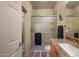 Nicely appointed bathroom featuring a glass-enclosed shower and granite countertops at 7445 E Eagle Crest Dr # 1094, Mesa, AZ 85207