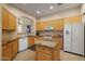 Spacious kitchen with granite countertops, stainless appliances, and center island at 7445 E Eagle Crest Dr # 1094, Mesa, AZ 85207