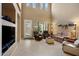 Bright living room featuring high ceilings, neutral tones, and cozy seating around a central coffee table at 7445 E Eagle Crest Dr # 1094, Mesa, AZ 85207