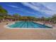 Luxury community pool with lap lanes, lounge chairs, and shaded pavilion offers residents a resort-style experience at 7445 E Eagle Crest Dr # 1094, Mesa, AZ 85207