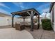 Covered gazebo with outdoor furniture creates a cozy backyard entertaining space at 790 E San Carlos Way, Chandler, AZ 85249