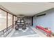 View of a covered parking area featuring a golf cart and decorative details at 8312 E Pueblo Ave, Mesa, AZ 85208