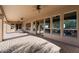 This long covered patio is perfect for outdoor gatherings, with seamless indoor-outdoor living at 9515 E Julep Cir, Mesa, AZ 85207
