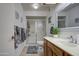 Well-lit bathroom with a shower, toilet, vanity, and decorative mirror at 1021 S Greenfield Rd # 1142, Mesa, AZ 85206