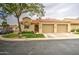 Charming single-story home with a two-car garage, desert landscaping, and a cozy front entrance at 1021 S Greenfield Rd # 1142, Mesa, AZ 85206