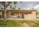 Relaxing covered patio with a table and chairs, ideal for enjoying the outdoors at 1021 S Greenfield Rd # 1142, Mesa, AZ 85206