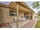 Inviting covered patio space with a table and chairs, perfect for outdoor dining at 1021 S Greenfield Rd # 1142, Mesa, AZ 85206