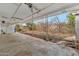 Spacious covered patio offering potential for outdoor living and overlooking the backyard space at 1048 E 2Nd Pl, Mesa, AZ 85203