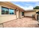 Spacious outdoor patio with tiled flooring, perfect for entertaining guests at 10646 W Tropicana Cir, Sun City, AZ 85351