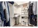 Well-organized walk-in closet with clothing racks and shelving offers ample storage space at 10960 E Monte Ave # 286, Mesa, AZ 85209