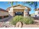 Exterior view of library featuring stone accents and a manicured landscape at 10960 E Monte Ave # 286, Mesa, AZ 85209