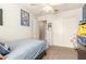 Bedroom with carpet, neutral walls, a ceiling fan, and sliding closet doors, provides a relaxing retreat at 11330 W Eden Mckenzie Dr, Surprise, AZ 85378