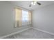 This bright bedroom features neutral carpet, and a window providing plenty of natural light at 1137 E Mcmurray Blvd, Casa Grande, AZ 85122