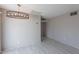 The dining room features tile flooring and an elegant light fixture, creating a welcoming space at 1137 E Mcmurray Blvd, Casa Grande, AZ 85122