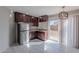 This modern kitchen features stainless steel appliances, dark wood cabinets, and granite countertops at 1137 E Mcmurray Blvd, Casa Grande, AZ 85122