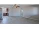 Open-concept living room showcasing tile floors and easy access to the adjacent kitchen area at 1137 E Mcmurray Blvd, Casa Grande, AZ 85122