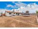 Spacious backyard featuring a trampoline, patio and a wall at 11403 N 57Th Dr, Glendale, AZ 85304