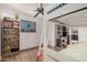 Bright bedroom featuring a ceiling fan, bunk bed and bookshelf at 11403 N 57Th Dr, Glendale, AZ 85304