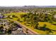 Aerial view of a neighborhood showcasing green spaces and proximity to parks and community amenities at 11431 N 37Th Pl, Phoenix, AZ 85028