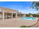 Expansive backyard featuring a pool, covered patio, pergola, and brick-paved deck at 11431 N 37Th Pl, Phoenix, AZ 85028