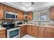 Stylish kitchen with stainless steel appliances and granite countertops at 11431 N 37Th Pl, Phoenix, AZ 85028