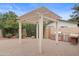 Outdoor kitchen with a pergola, built-in grill, and counter space perfect for entertaining guests at 11431 N 37Th Pl, Phoenix, AZ 85028