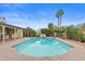 Inviting pool with waterfall feature and mature landscaping offers a private backyard oasis at 11431 N 37Th Pl, Phoenix, AZ 85028