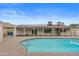 A beautiful swimming pool surrounded by an expansive patio area, perfect for outdoor entertaining at 11431 N 37Th Pl, Phoenix, AZ 85028