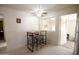 Bright breakfast nook with a table and chairs next to the kitchen, perfect for casual dining at 120 N 54Th St, Mesa, AZ 85205