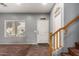 Home's Foyer with door, stairs and large window at 12162 W Dreyfus Dr, El Mirage, AZ 85335