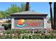 Sun City West monument sign with colorful flowers and landscaping at 12418 W Galaxy Dr, Sun City West, AZ 85375